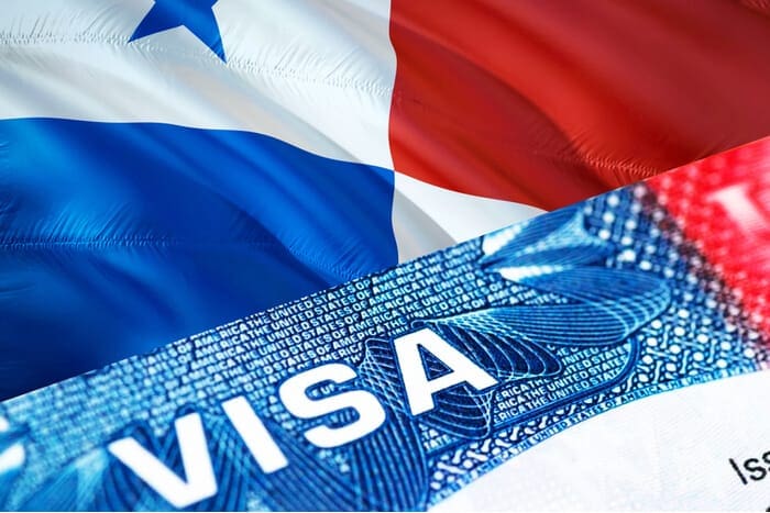 Visa resting on Panamanian flag