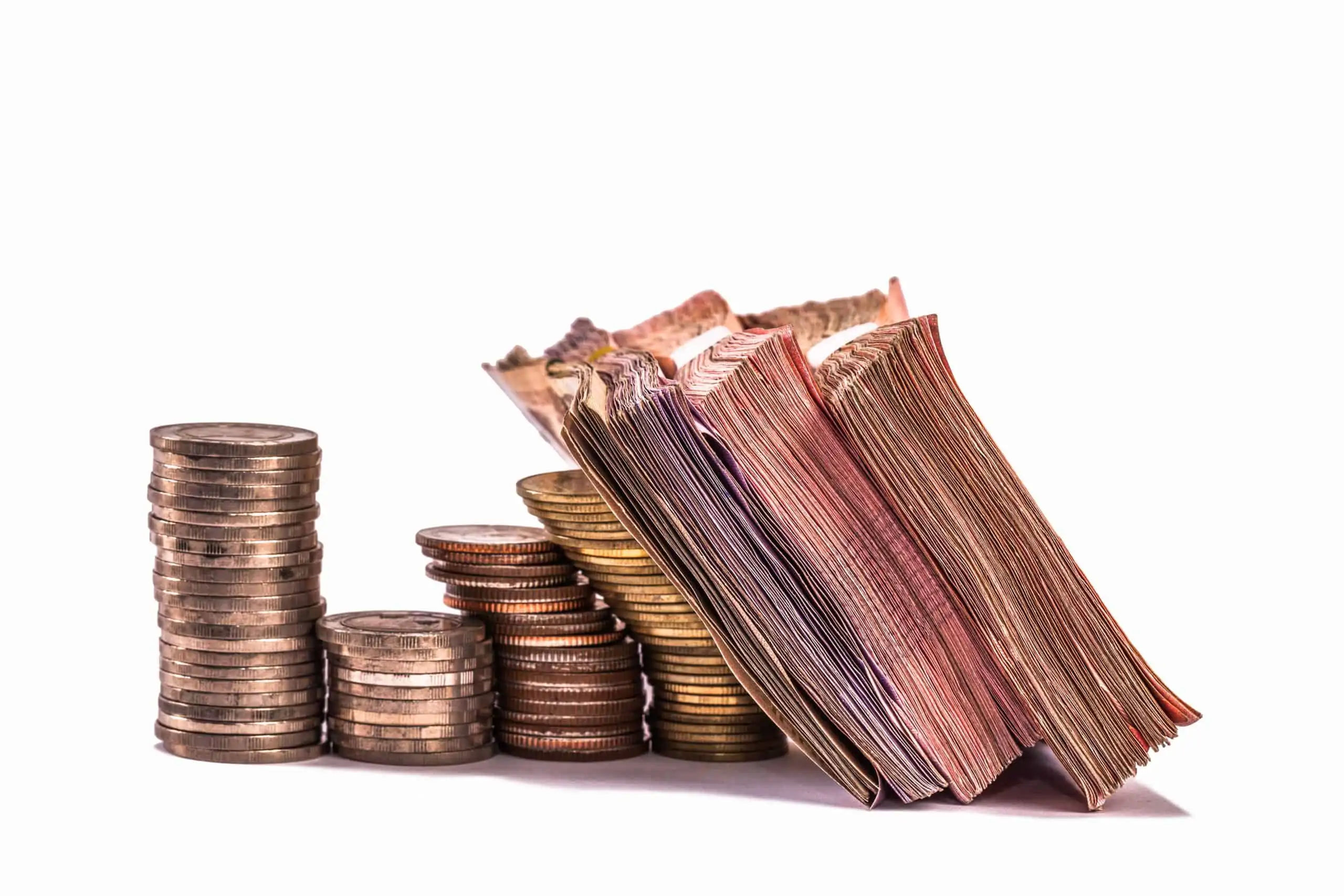 Offshore bank account currency - Pile of coins and paper bills