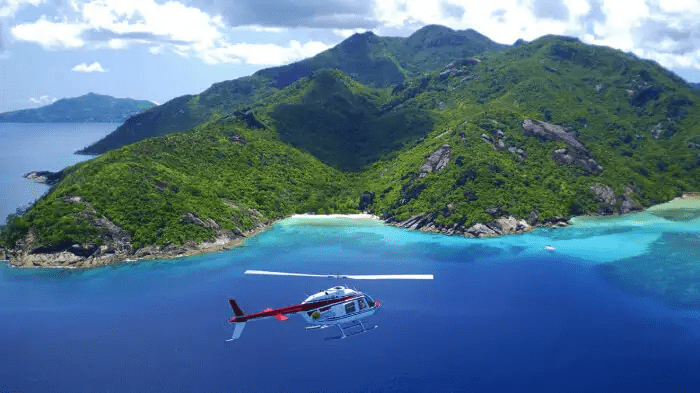 Experience flying in style and luxury as you take an aerial tour of the Seychelles islands.